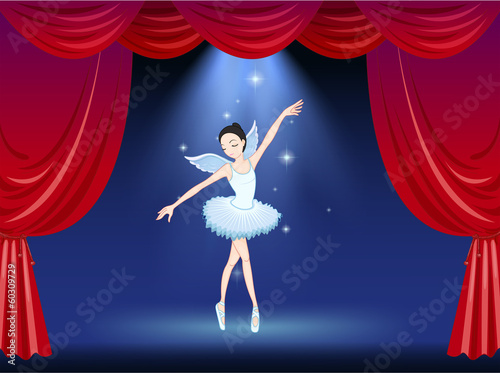 A stage with a ballerina dancer