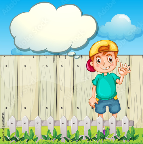 A young boy with an empty thought standing near the fence