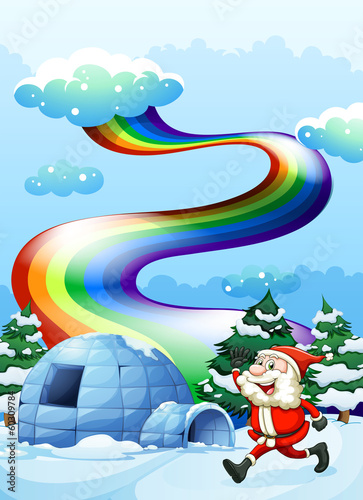 A happy Santa walking near the igloo under the rainbow