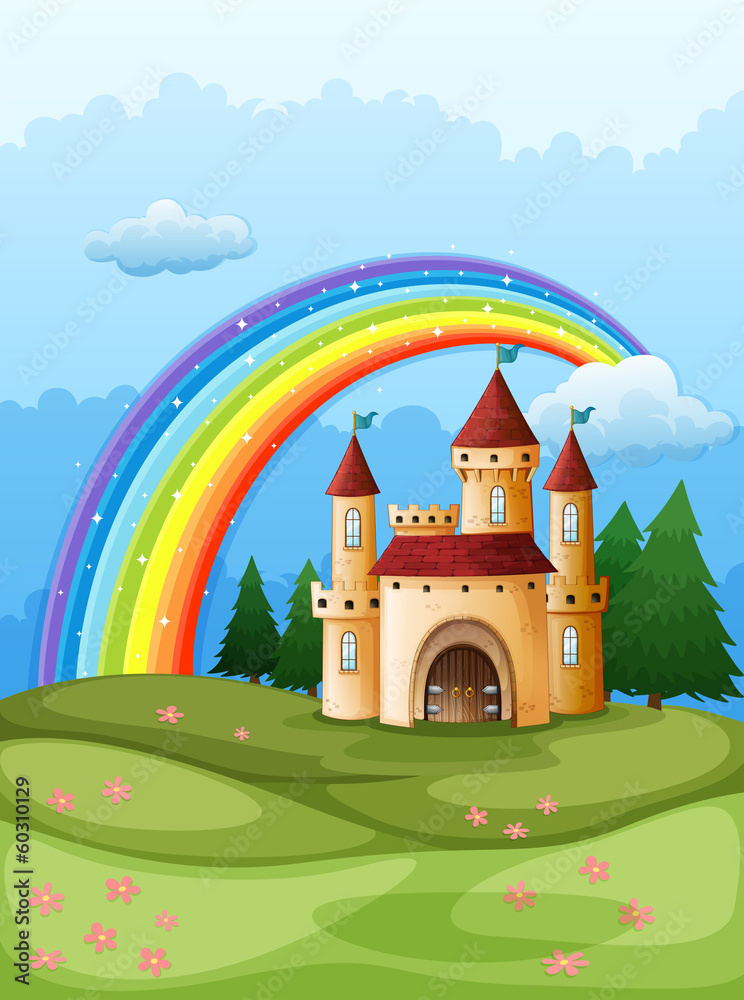 A castle at the hilltop with a rainbow