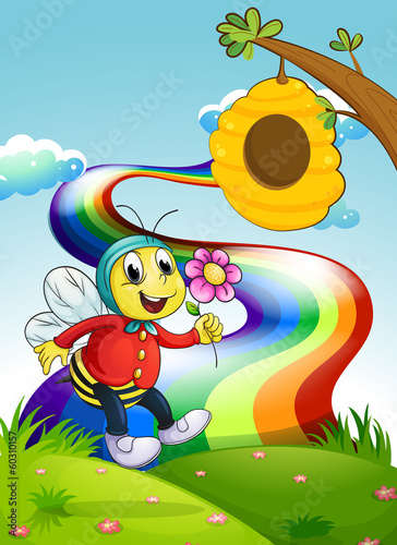 A smiling bee holding a flower at the hilltop with a rainbow