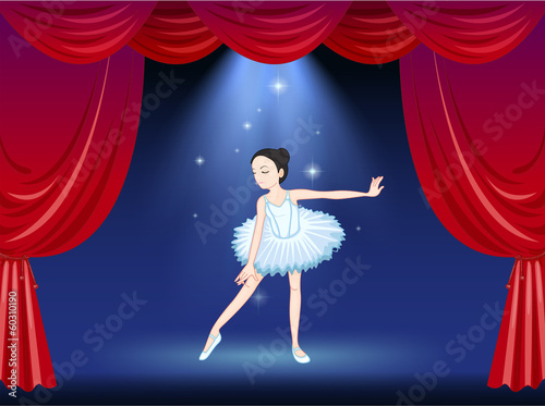 A ballerina dancing at the stage