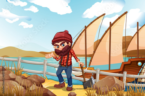 A lumberjack holding an axe near the sea