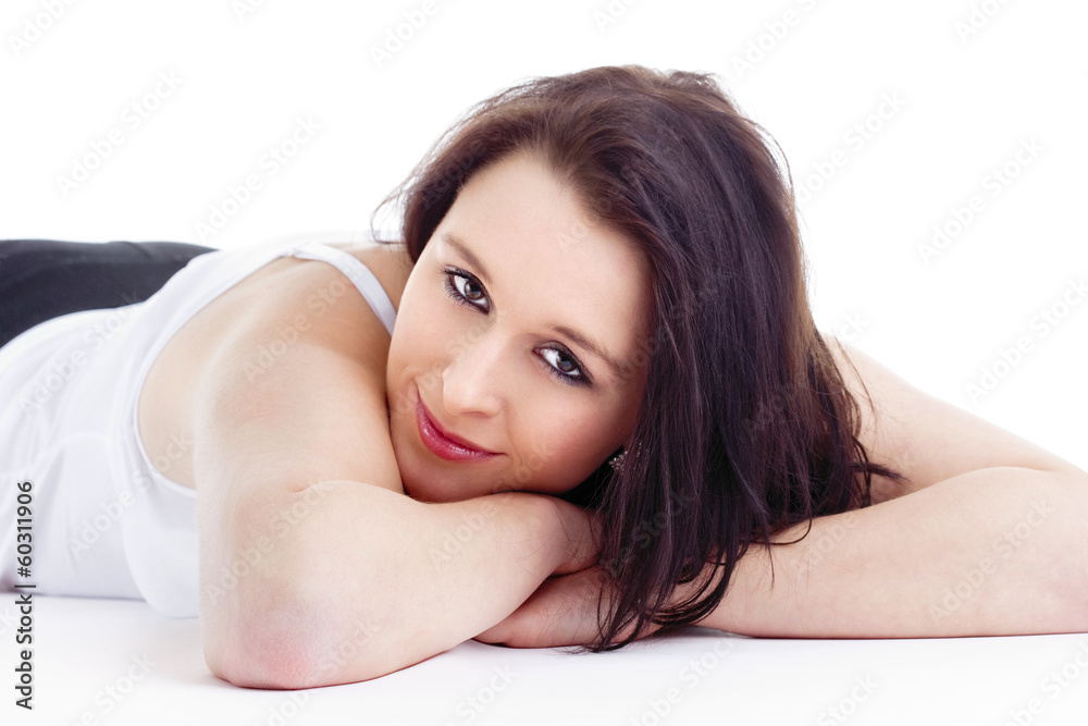 Portrait of Young Woman Lying on the Floor Looking Portrait of Young Woman Lying on the Floor Looking