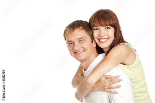 Young couple hugging each other.
