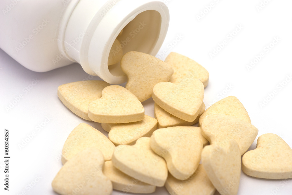 Heart-shaped Tablets  Spills from Container
