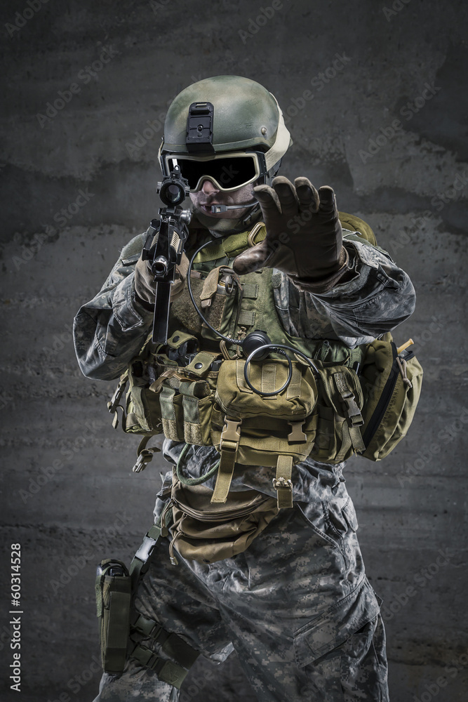 Soldier with rifle and mask in alt gesture Soldier with rifle and mask in alt gesture
