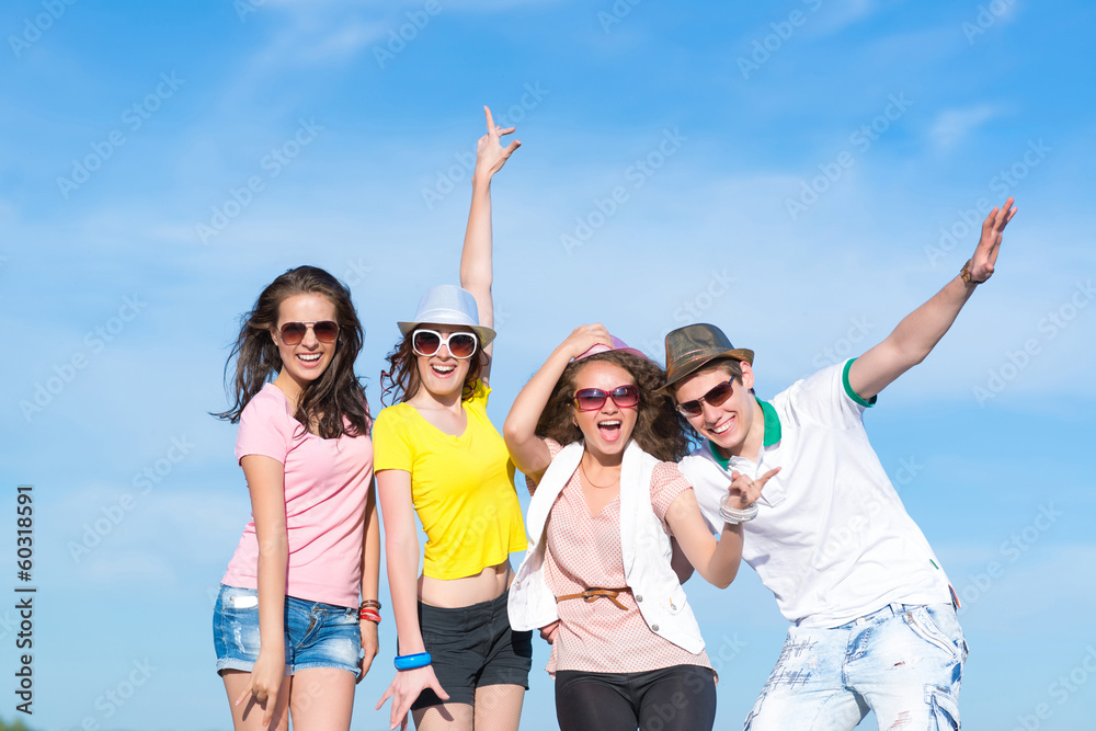Group of young people having fun - obrazy, fototapety, plakaty 