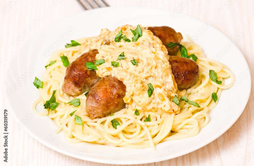 spaghetti with sausage and sauce