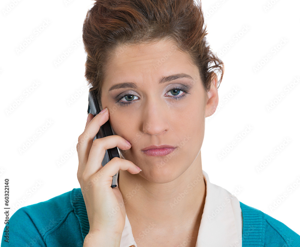Closeup portrait upset, sad, depressed, worried woman on phone Closeup portrait upset, sad, depressed, worried woman on phone