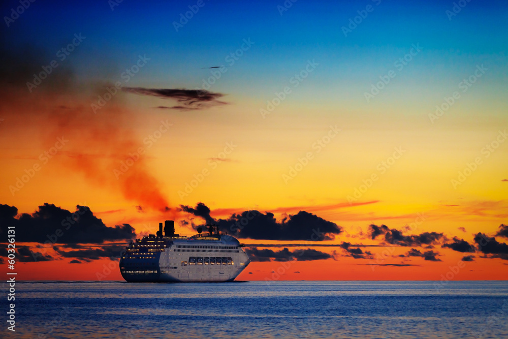 Large cruise ship on calm sea at sunset Large cruise ship on calm sea at sunset