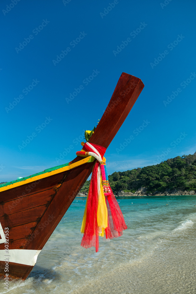 Longthail thai boats at the beach on tropical island Thailand Longthail thai boats at the beach on tropical island Thailand