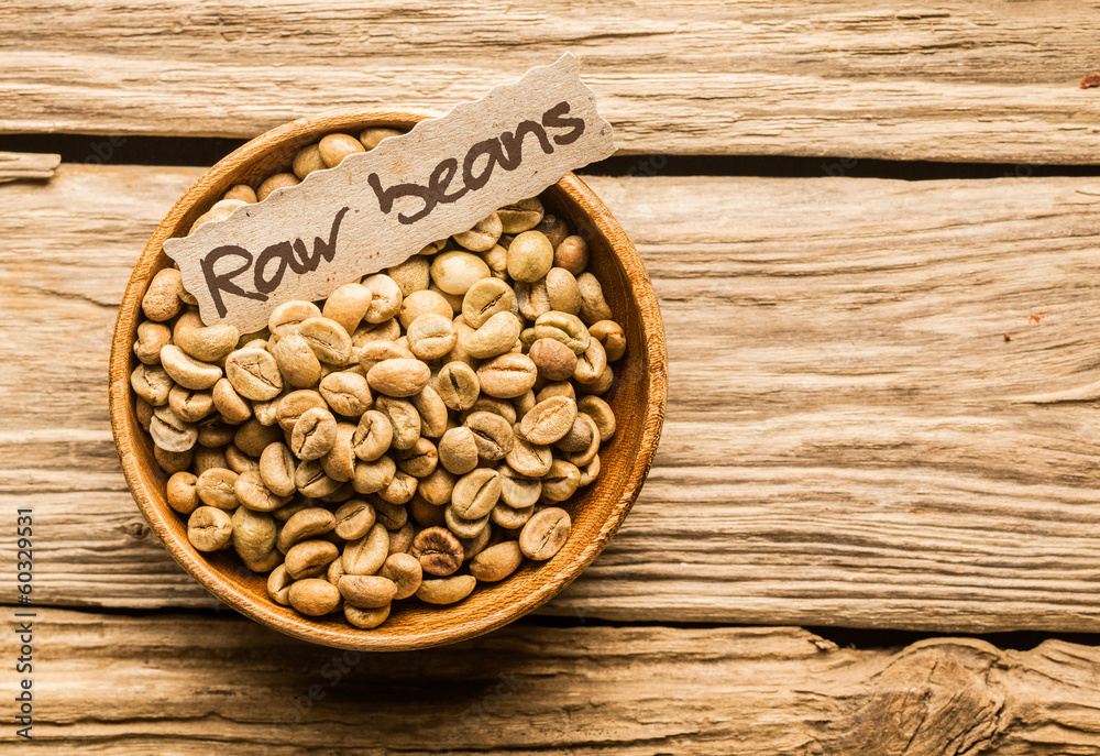 Bowl of raw coffee beans Bowl of raw coffee beans