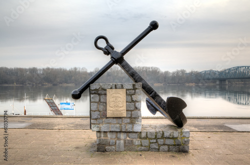 Anchor monument at the embankment of Vistula. Torun, Poland