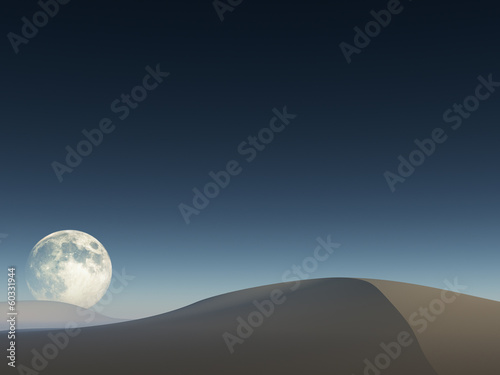 Moon over sand drifts