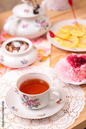 Warm cup of tea and sweets