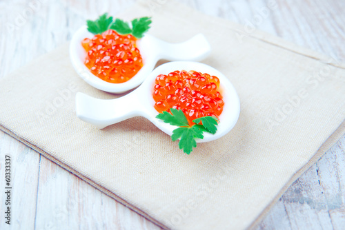 jar with red caviar photo