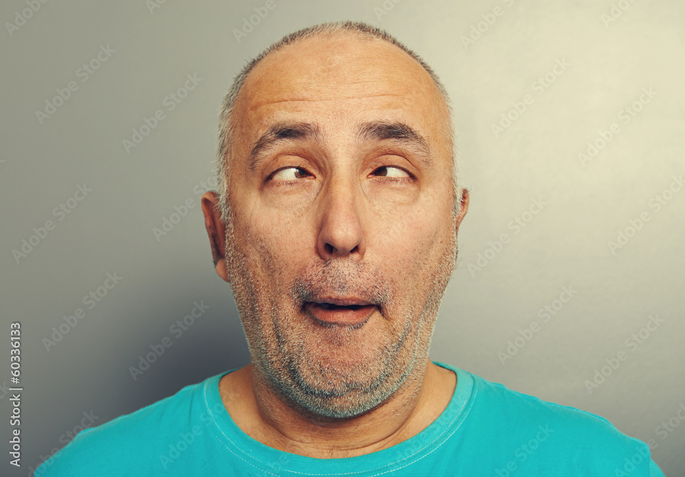 funny senior man in blue t-shirt funny senior man in blue t-shirt