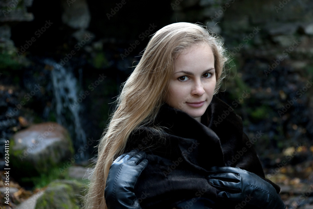 Naklejka premium Woman in Black Fur Coat