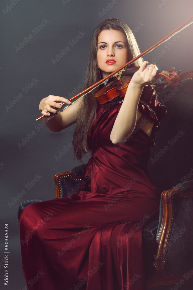 Elegant fiddle player Elegant fiddle player