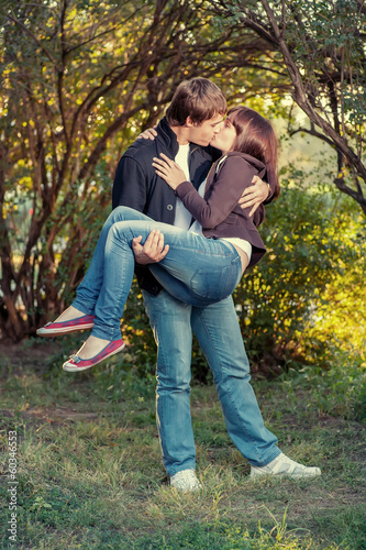 romantic young couple kissing... © mettus