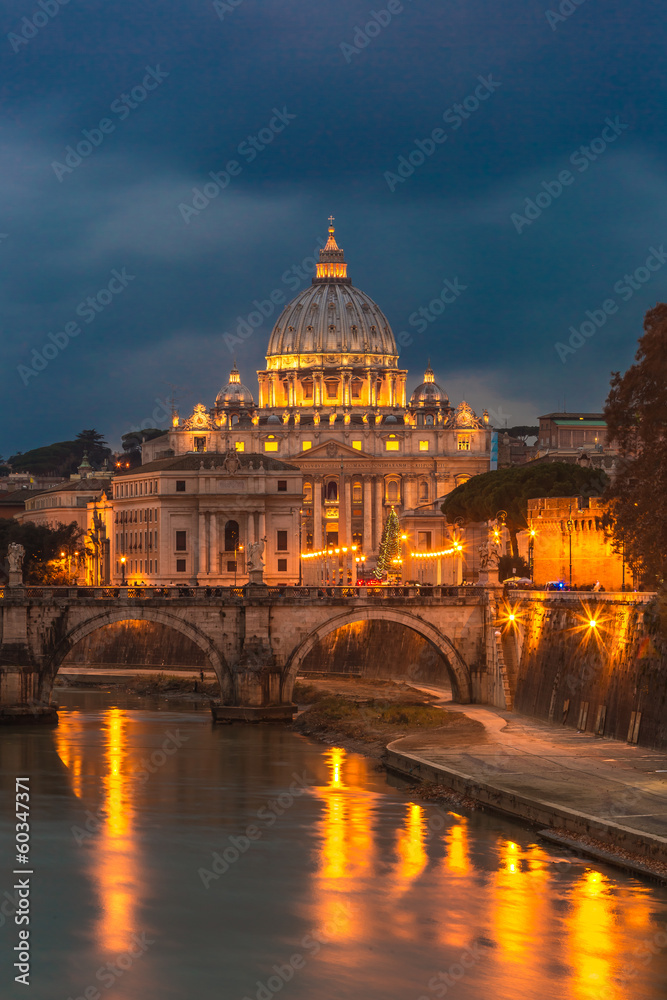 Vatican and river Tiber in Rome - Italy at night .