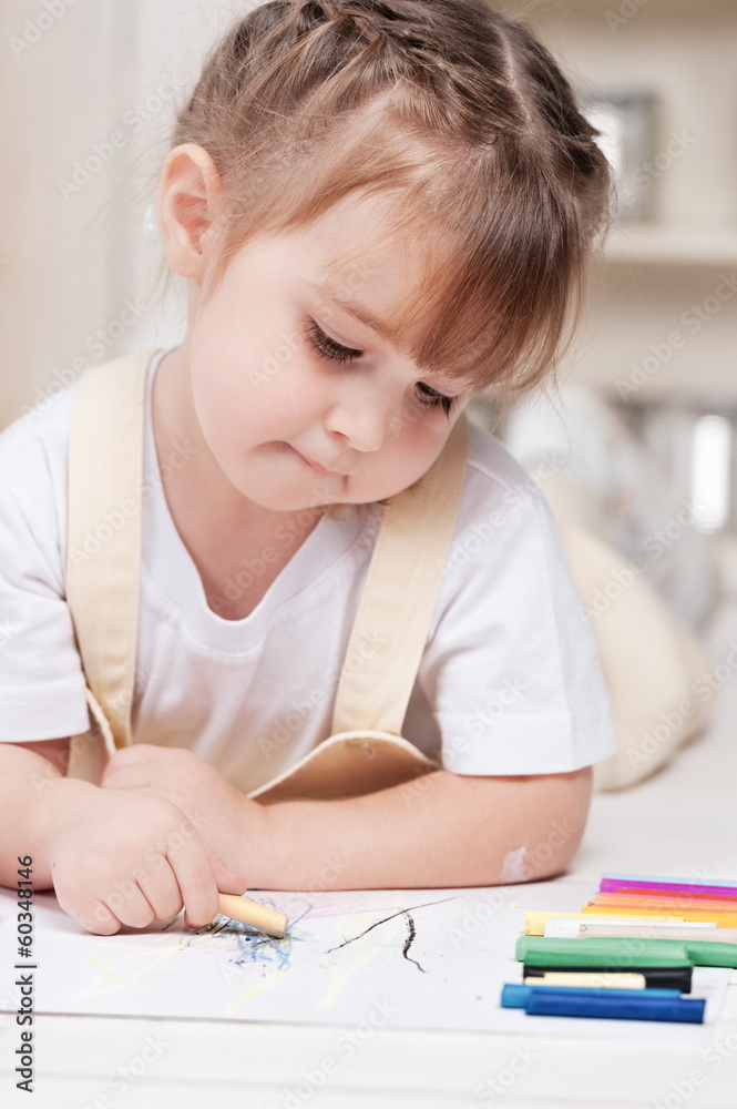 Little girl artist paints in his studio Little girl artist paints in his studio