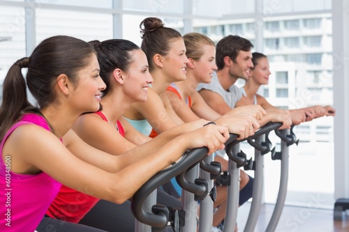 Fit people working out at spinning class © WavebreakMediaMicro