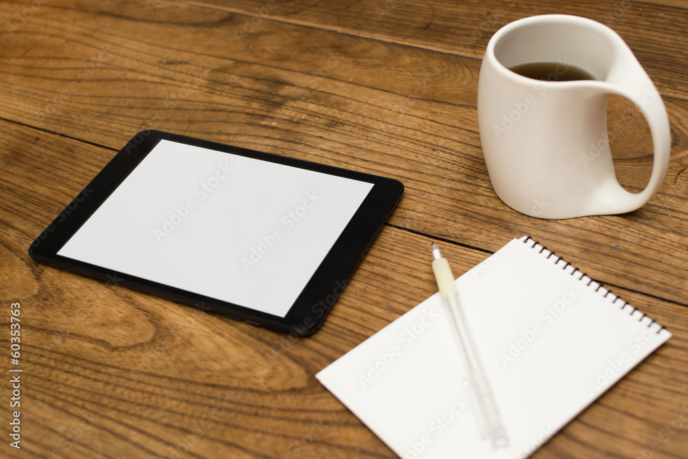 Digital tablet, coffee, notepad and pen Digital tablet, coffee, notepad and pen