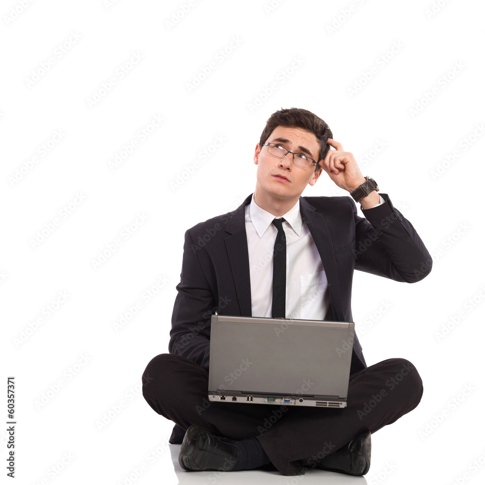 Elegance male student with laptop thinking. Elegance male student with laptop thinking.