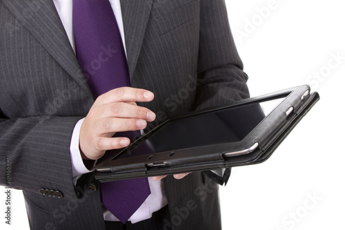Businessman using touch pad, close up shot, isolated