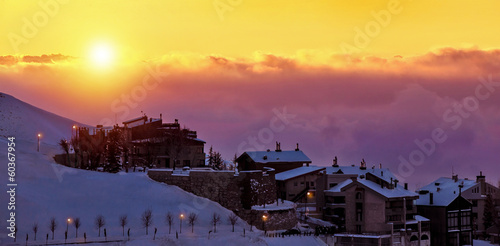 Beautiful sunset in snowy mountainous village