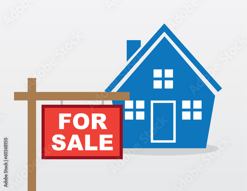 House with red for sale sign outside
