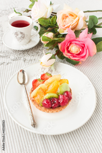 Tartlet with fresh fruits and berries  closeup