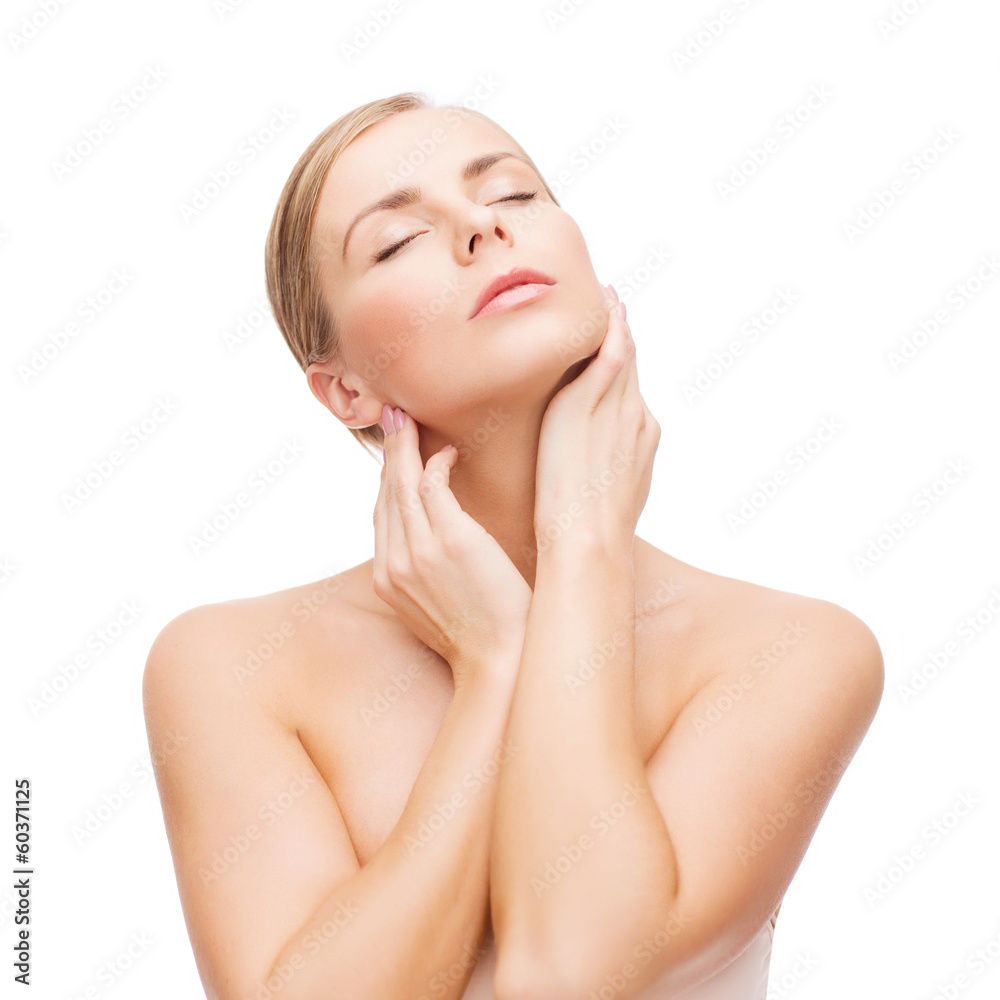 beautiful woman touching her face with closed eyes beautiful woman touching her face with closed eyes