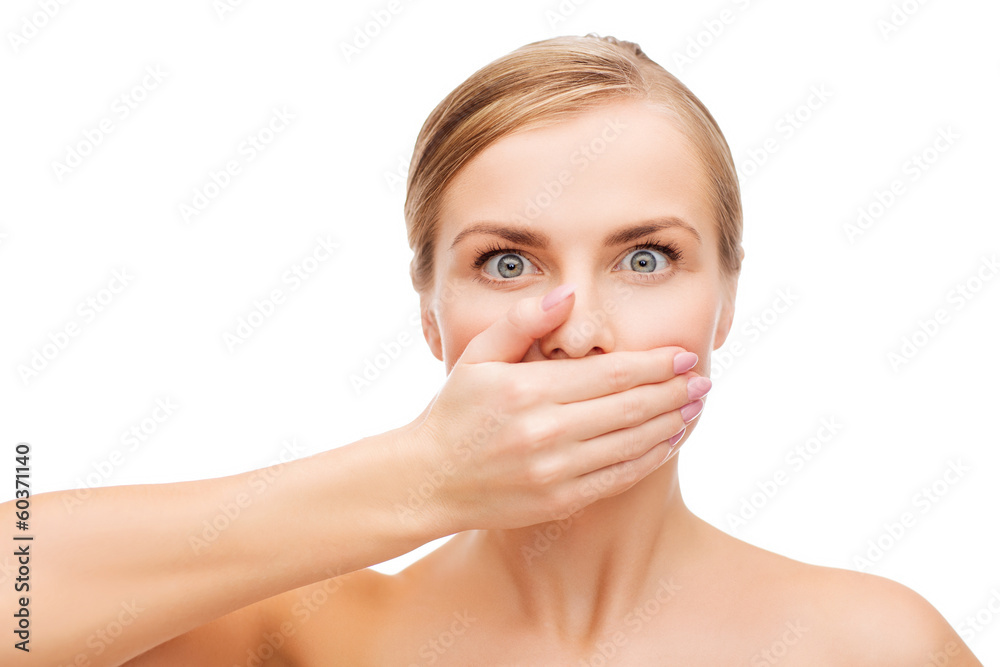 young woman doing hush gesrute