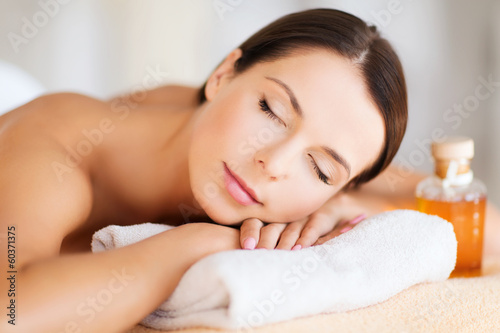 happy woman in spa salon