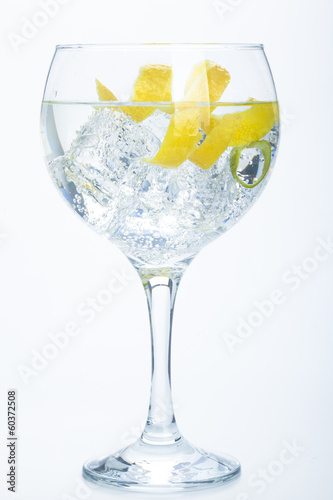 orange lemon and lime gin tonic isolated over white