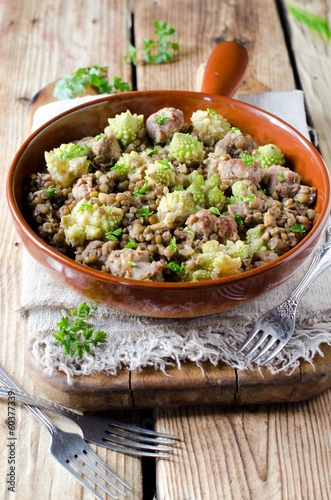 Green lentils with homemade sausage and cabbage romanesco