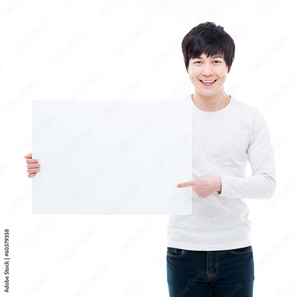 Young Asian man showing a pannel card Young Asian man showing a pannel card