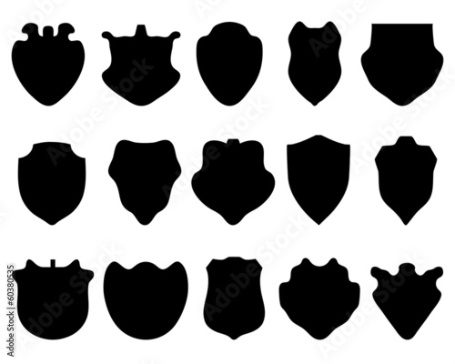 Black silhouettes of different shields, vector