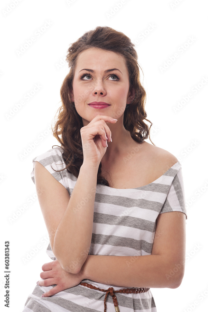Thoughtful smiling woman looking up at copy space Thoughtful smiling woman looking up at copy space