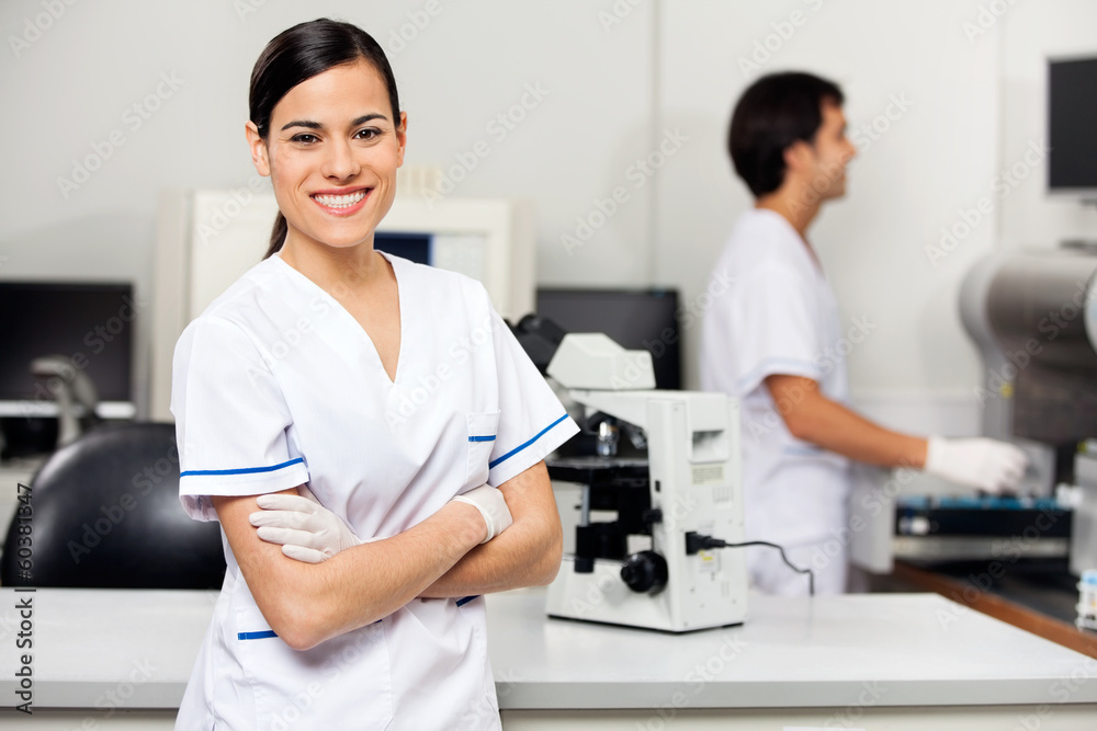 Smiling Female Scientist In Laboratory Smiling Female Scientist In Laboratory