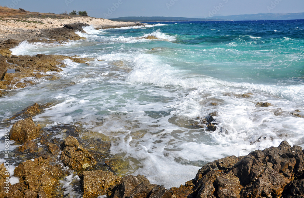 Powerful waves crushing on a rocky beach Powerful waves crushing on a rocky beach