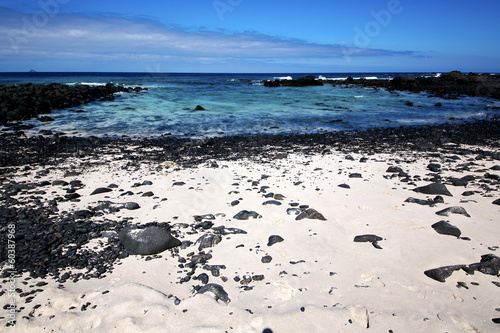 black rock spain landscape sky cloud beach in lanzarote isle