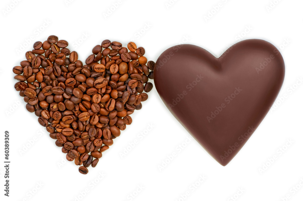 two hearts of chocolate and coffee beans on white background two hearts of chocolate and coffee beans on white background