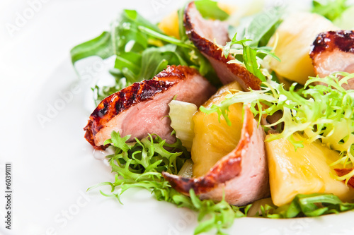 salad with pineapple and smoked meat