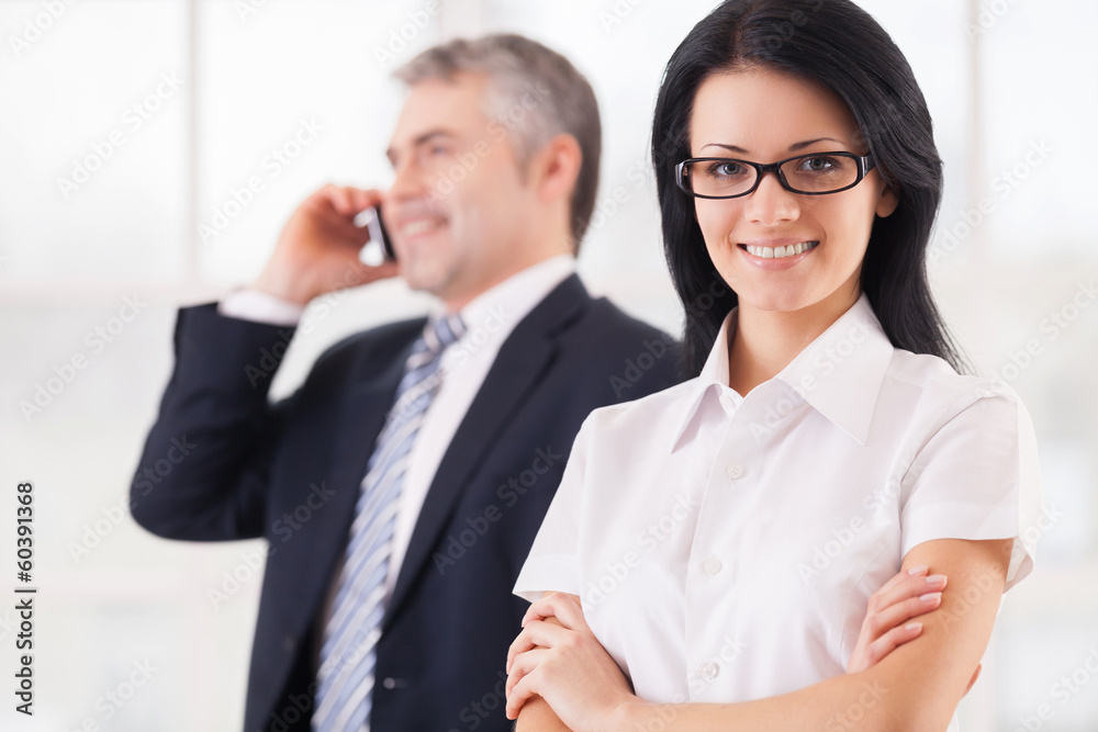 Confident and successful business people. Confident and successful business people.