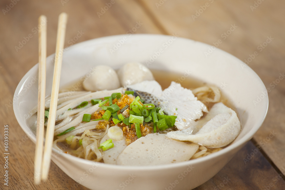 Pork meatballs and steam fish in noodle soup
