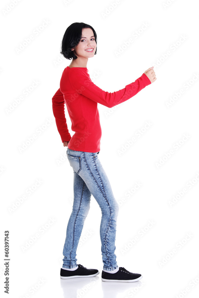 Side view of walking beautiful woman Side view of walking beautiful woman